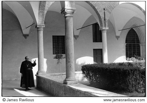 Priest in a cloister, San Gimigniano, Italy, 1978