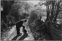 Archie Parkhouse with his dog Sally, Millhams, Dolton, Devon, England, 1982